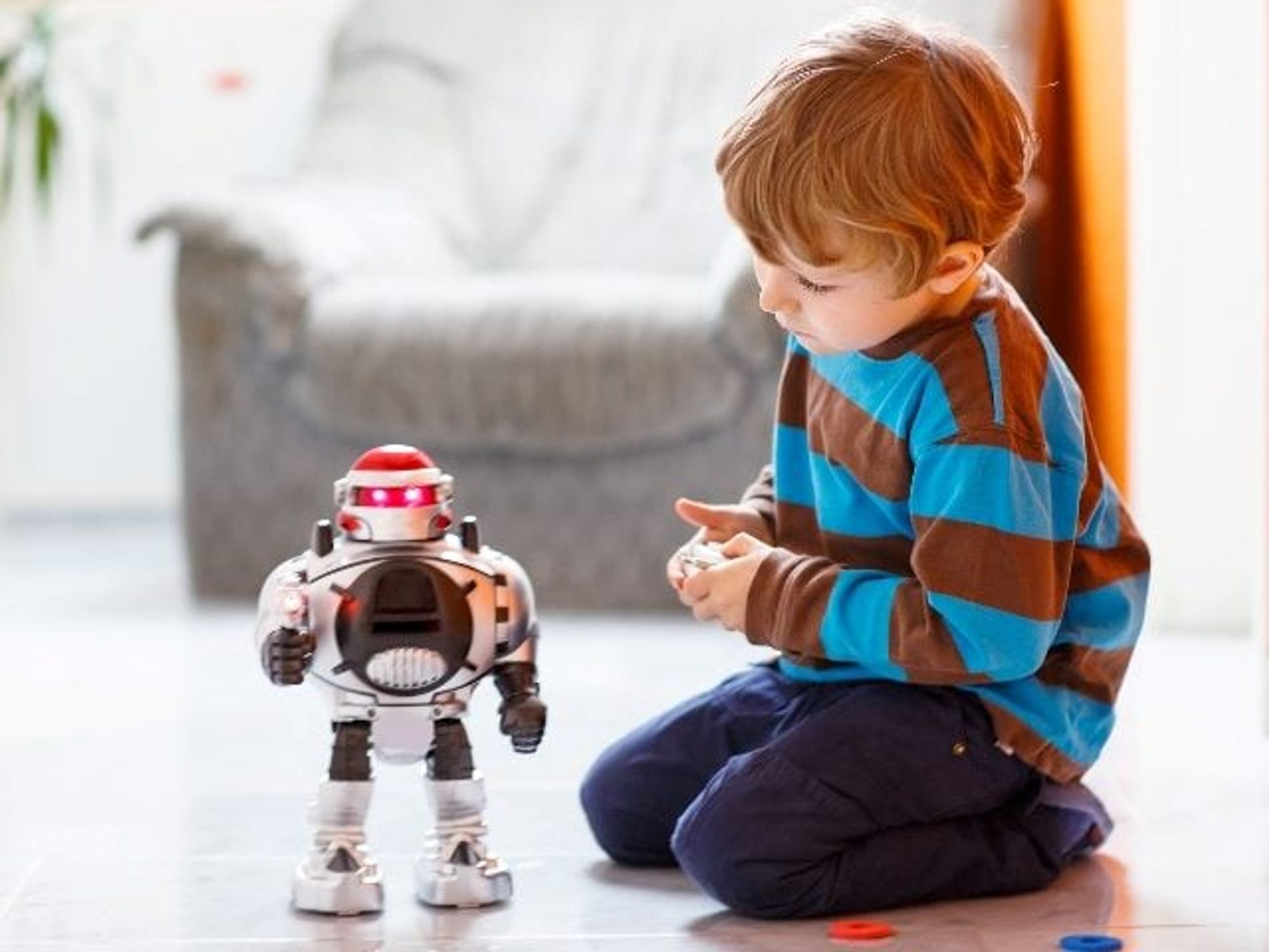 AI in Digital Marketing_ A child plays with toy robot.jpg